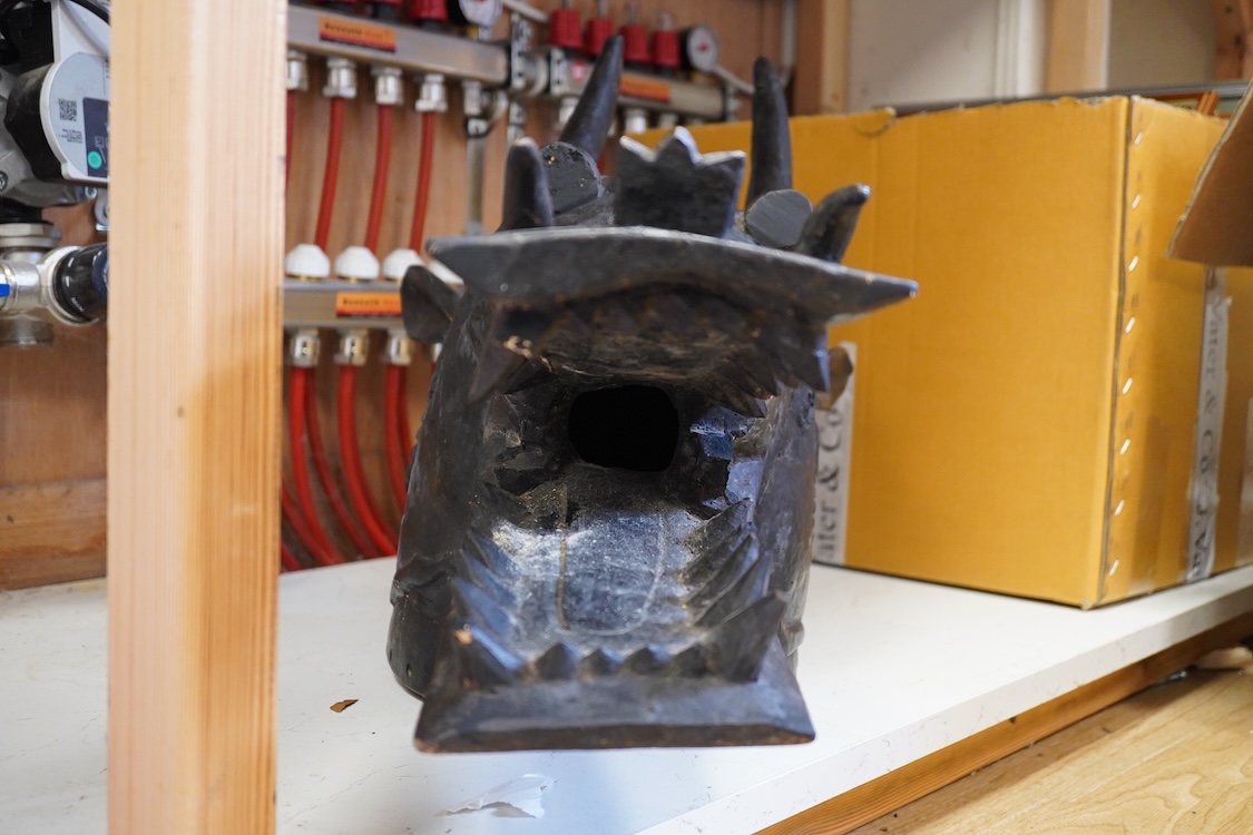 African art - a Senufo carved wooden helmet mask (Kponyugo), Ivory Coast, early 20th century, 88cm